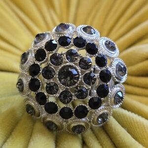 Silver ring with black stones
